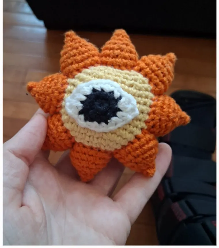 Mr Sun with the rays in place and a face sewn on